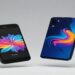 Two smartphones, the compact Apple iPhone SE (3rd Gen) and the larger Samsung Galaxy A55, floating in mid-air with bright screens displaying a colorful abstract graphic.